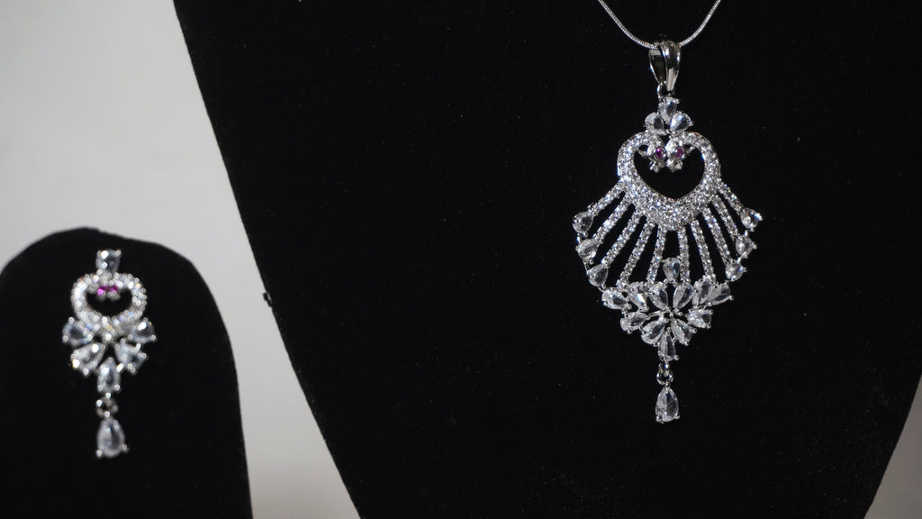 Exquisite Silver-Toned Floral Fan Pendant Set with Radiant Pink Accents and Matching Drop Earrings