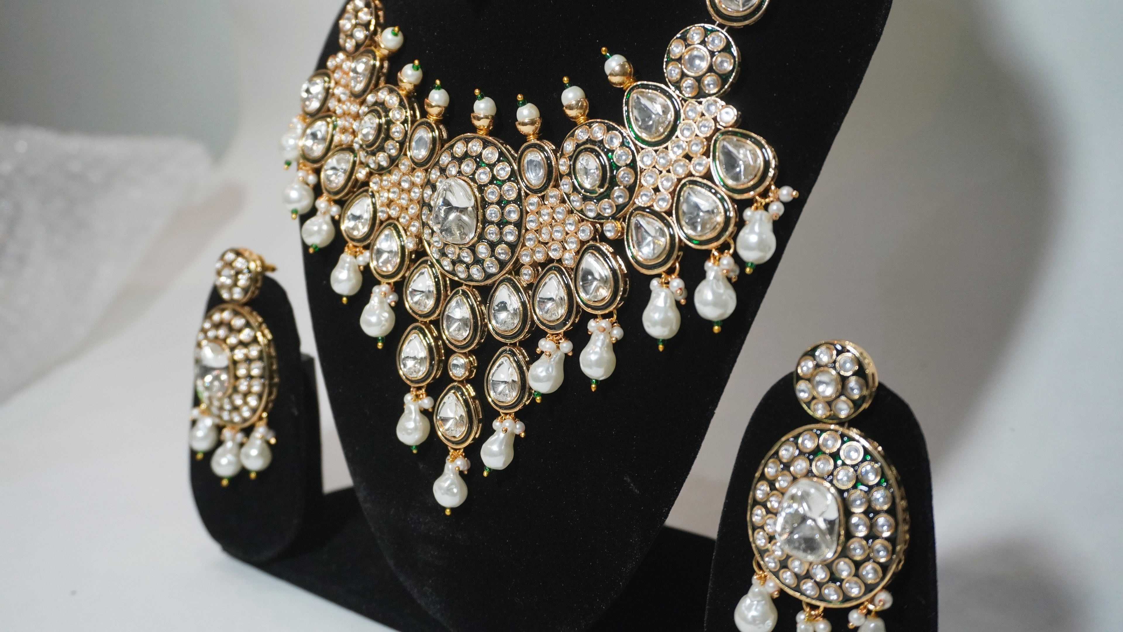 The Empress Meenakari Collection-Handcrafted Green & Gold Kundan Necklace with Matching Earrings & Maang Tikka