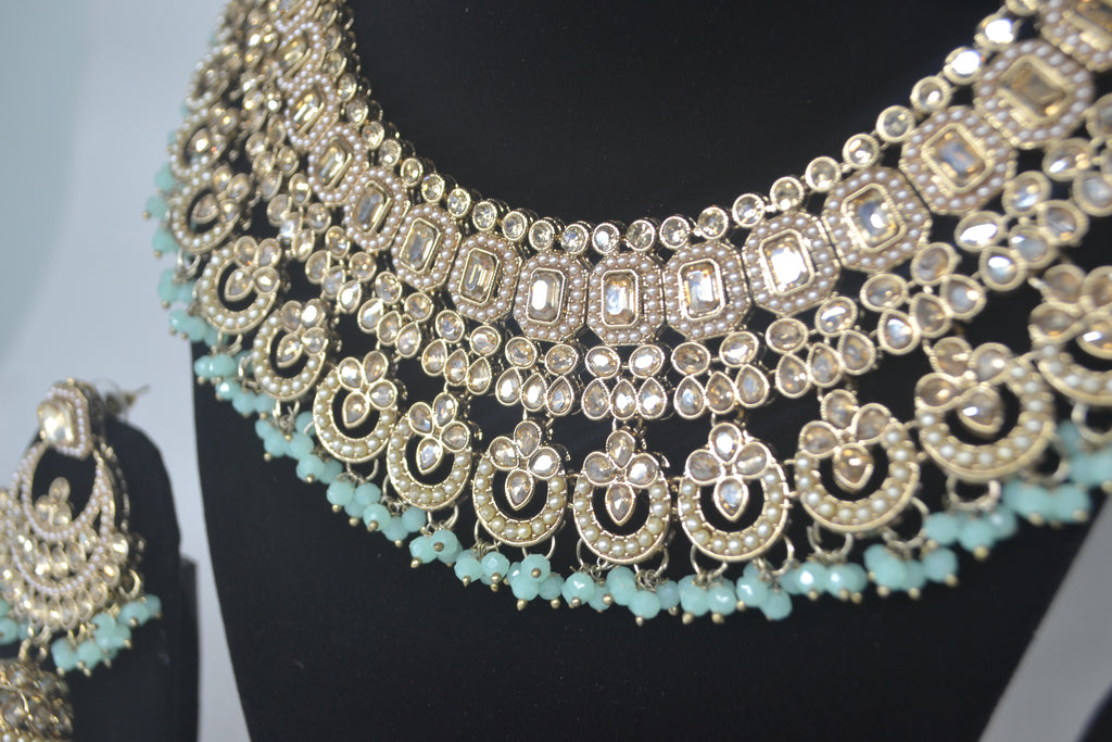 Designer Polki-Style Choker Necklace Set with Jhumka and Maang Tikka