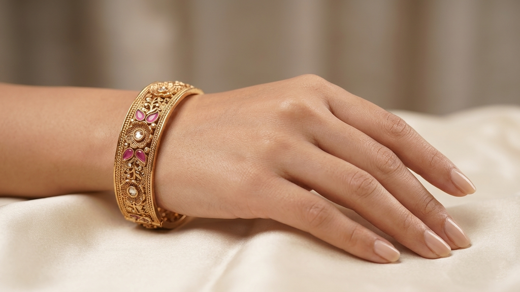 Elegant Gold-Toned Floral Kada Bangles with Vibrant Pink Accents and Intricate Filigree Work