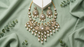 The Empress Meenakari Collection-Handcrafted Green & Gold Kundan Necklace with Matching Earrings & Maang Tikka